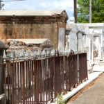 Rusty fence in graveyard