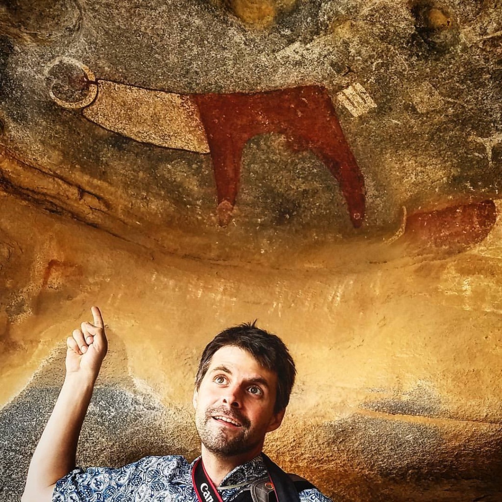 Me at las geel pointing to cave art.